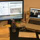 A desk covered in garbage shouts devotionals to God for the opportunity to serve her through blogging at the stylish Jezebel pod.